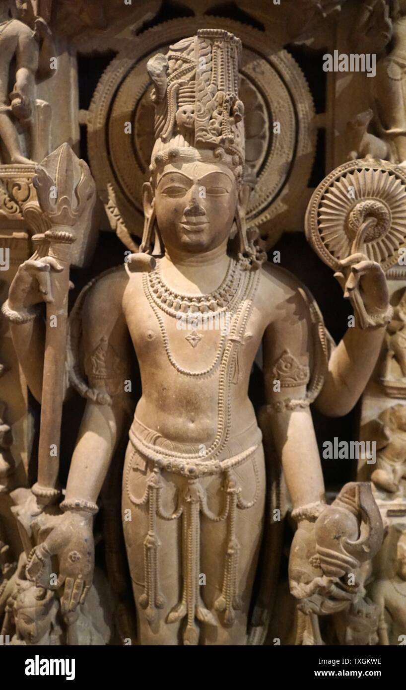 La scultura raffigurante Harihara, Vishnu e Shiva combinati, dalla dinastia Chandela. Datata xi secolo Foto Stock