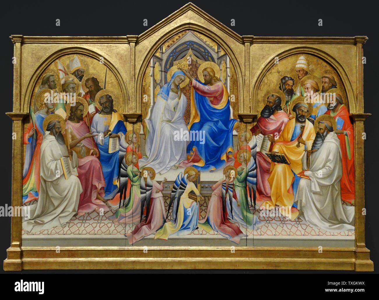 Pittura intitolata 'L'Incoronazione della Vergine e Santi adorante' di Lorenzo Monaco (1370-1425) un pittore italiano del tardo gotico-rinascimentale precoce età. Datata xv secolo Foto Stock