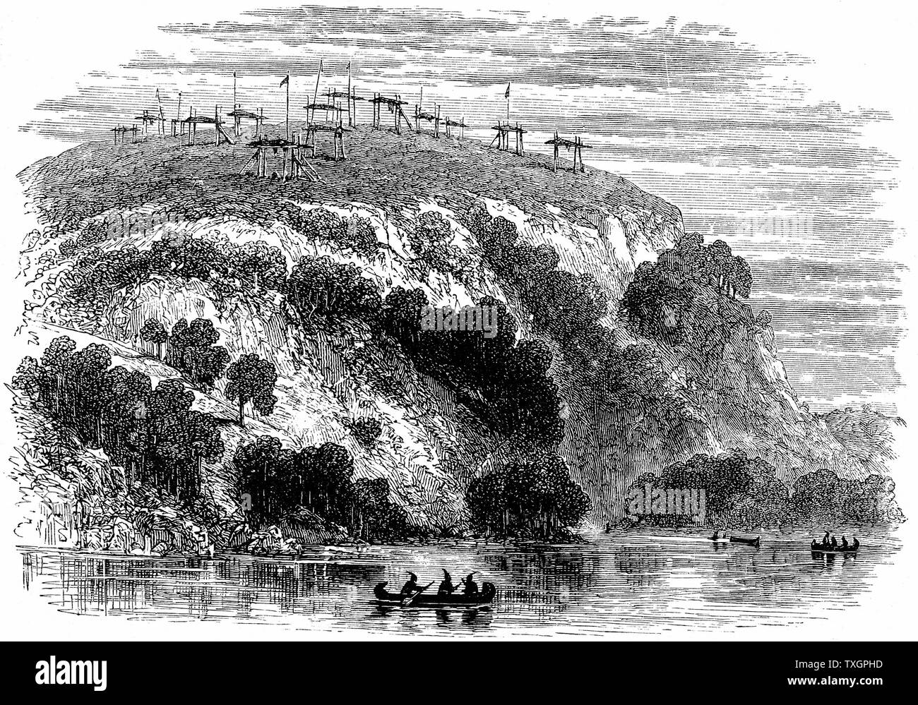 Nativi Nord Americani terreno di sepoltura, mostrando i morti su piattaforme rialzate. 1876 incisione su legno Foto Stock