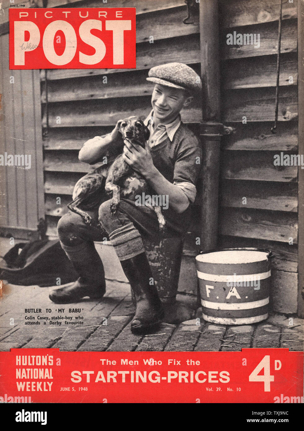 1948 Immagine Post magazine pagina anteriore di un ragazzo stabile, Colin Casey e il suo cane Foto Stock