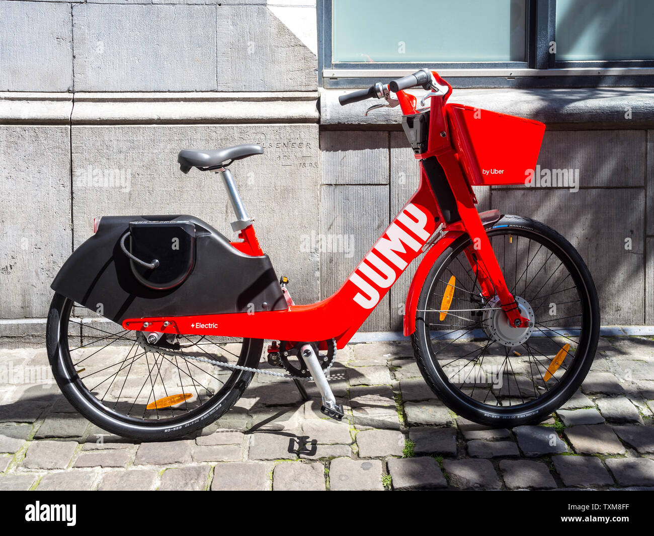 "Saltare" elettrico biciclette a noleggio - Bruxelles, Belgio. Foto Stock