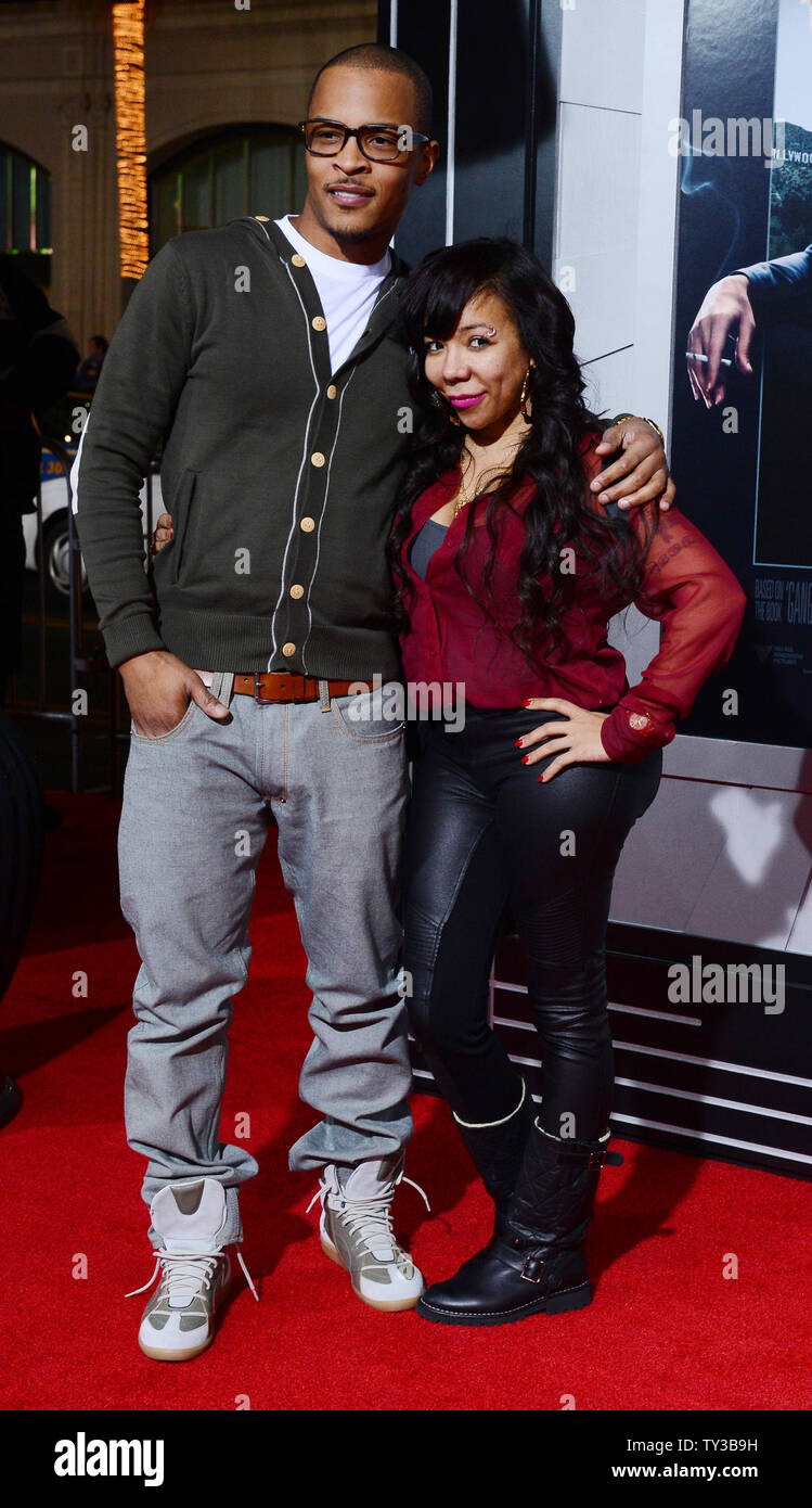 Il rapper T.I. e la moglie Tameka 'Tiny' Cottle frequentare la premiere del motion picture drama criminalità "Gangster Squad', a Grauman's Chinese Theater nella sezione di Hollywood di Los Angeles il 7 gennaio 2013. UPI/Jim Ruymen Foto Stock