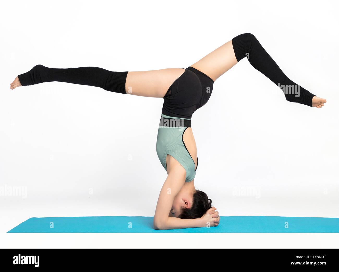 Bella professional insegnante di yoga Foto Stock