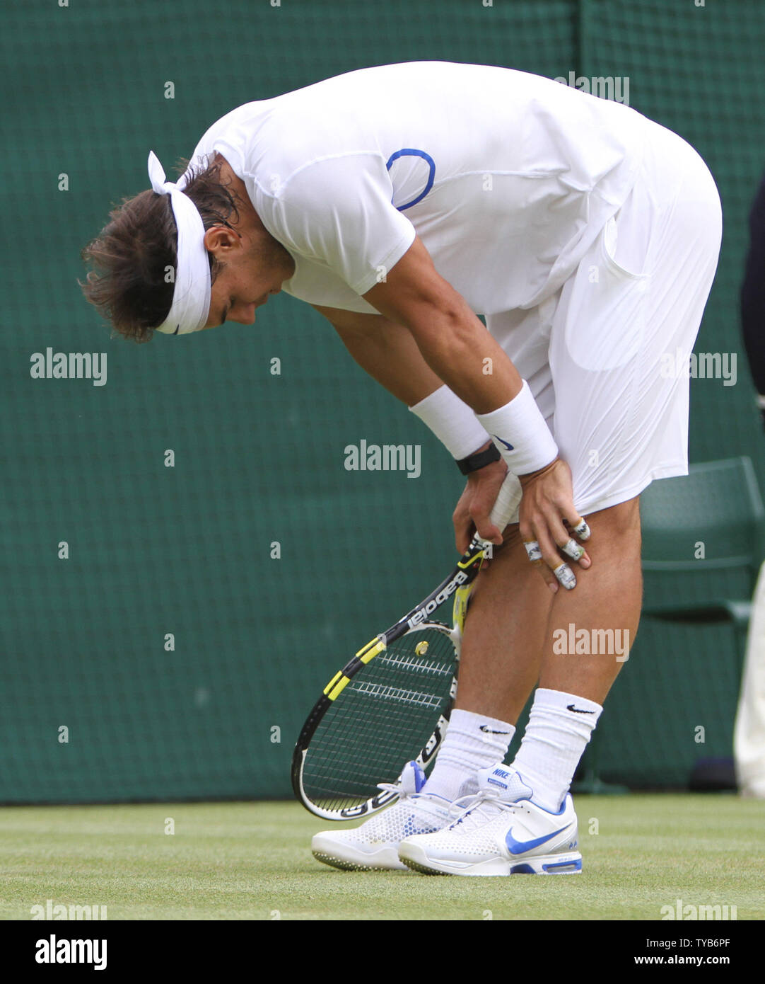 La Spagna di Rafael Nadal reagisce nella sua partita contro il Lussemburgo è Gilles Muller il sesto giorno della 125th campionati di Wimbledon in Wimbledon,Inghilterra Sabato 25 Giugno, 2011. UPI/Hugo Philpott Foto Stock