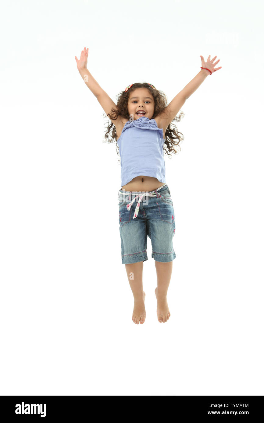 La ragazza del salto in aria Foto Stock