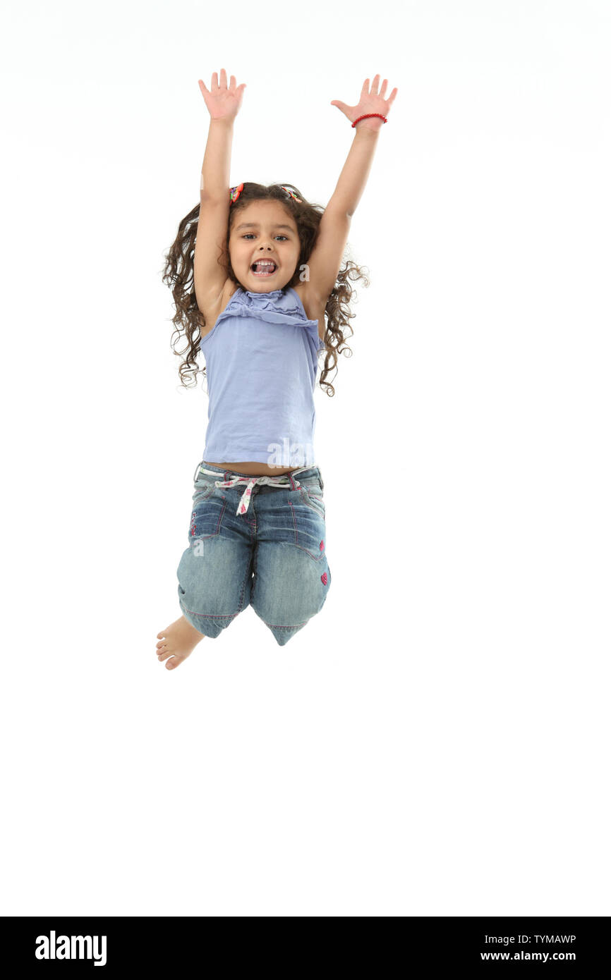 La ragazza del salto in aria Foto Stock