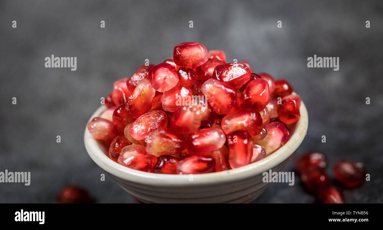 Rosso i semi di melograno Foto Stock