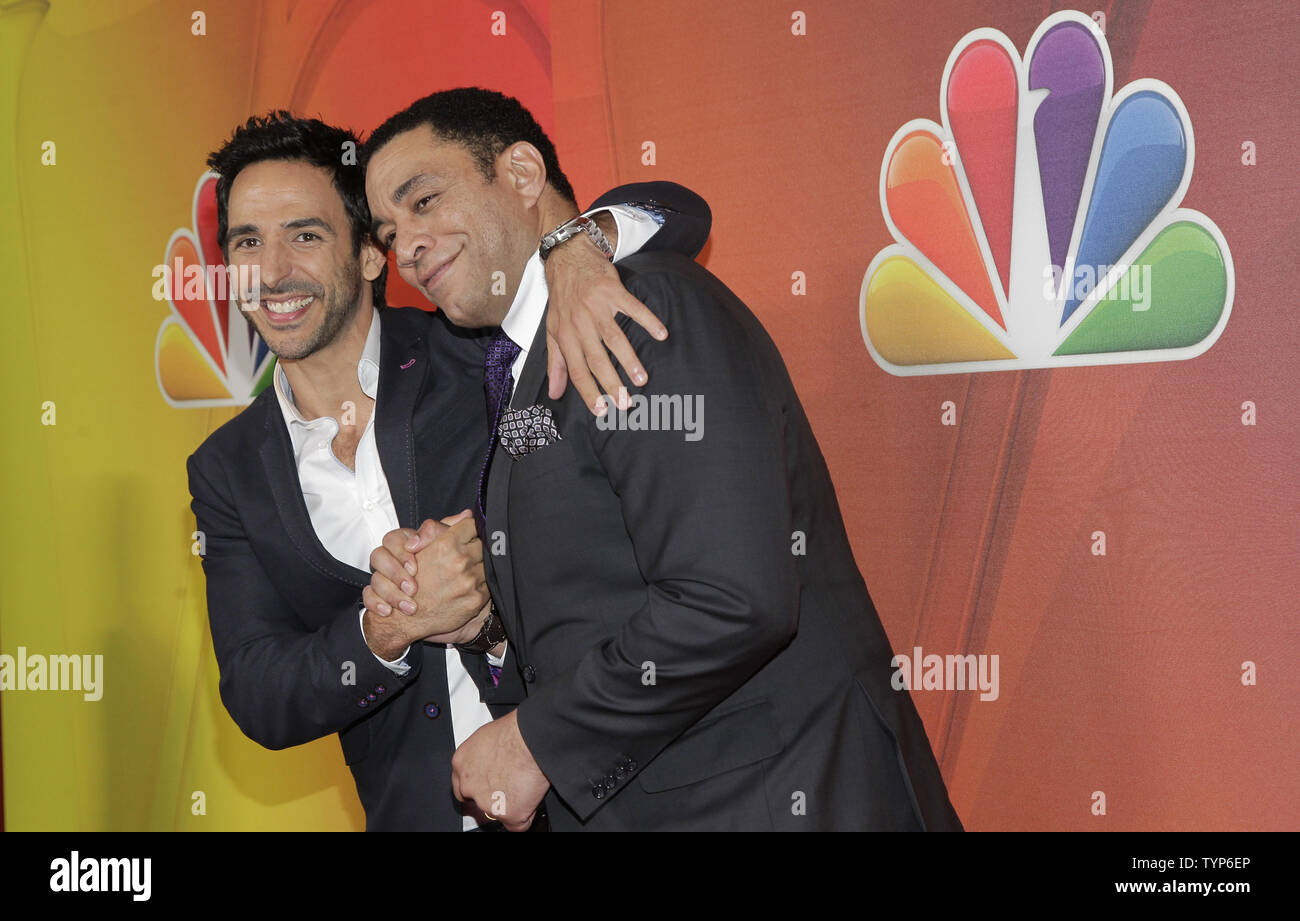 Amir Arison e Harry Lennix arrivano sul tappeto rosso al NBC's iniziali di presentazione presso il Jacob Javitz Center a New York City il 12 maggio 2014. UPI/John Angelillo Foto Stock