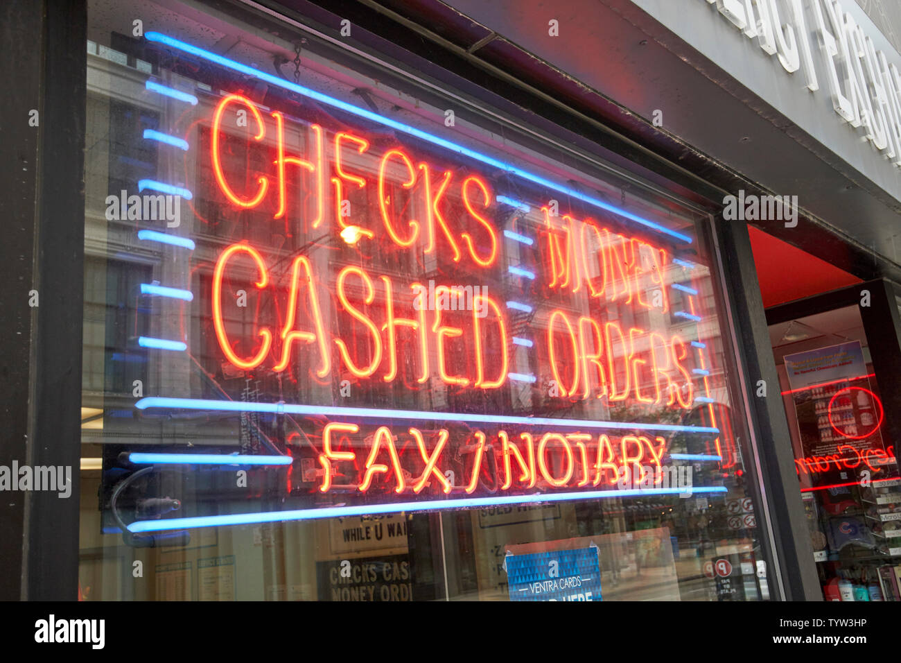 Insegna al neon in una vetrina di un negozio per assegni riscossi o ordini di denaro e fax notaio Chicago IL USA Foto Stock