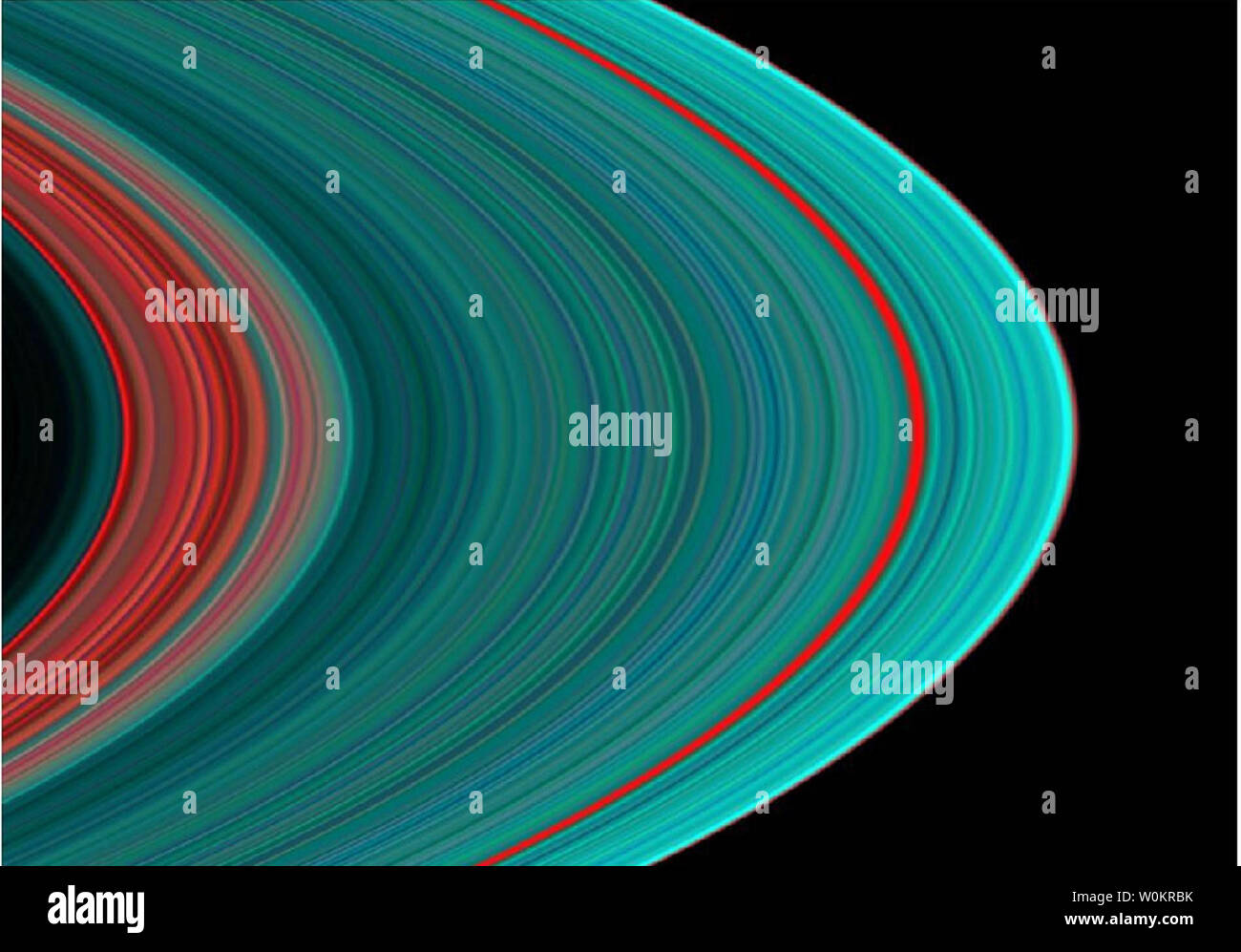 Immagini prese durante la sonda Cassini orbitale di inserimento su Giugno 30 mostrano la variazione di composizione in A, B e C gli anelli. Dall'interno, la "Divisione di Cassini' in debole rosso a sinistra è seguita da un anello nella sua interezza. La divisione di Cassini a sinistra contiene più sottili, più sporco anelli rispetto al turchese un anello, indicando una più gelide composizione. La banda rossa di circa tre quarti della strada verso l'esterno in un anello è noto come il divario Encke. (UPI foto/attraverso la NASA) Foto Stock