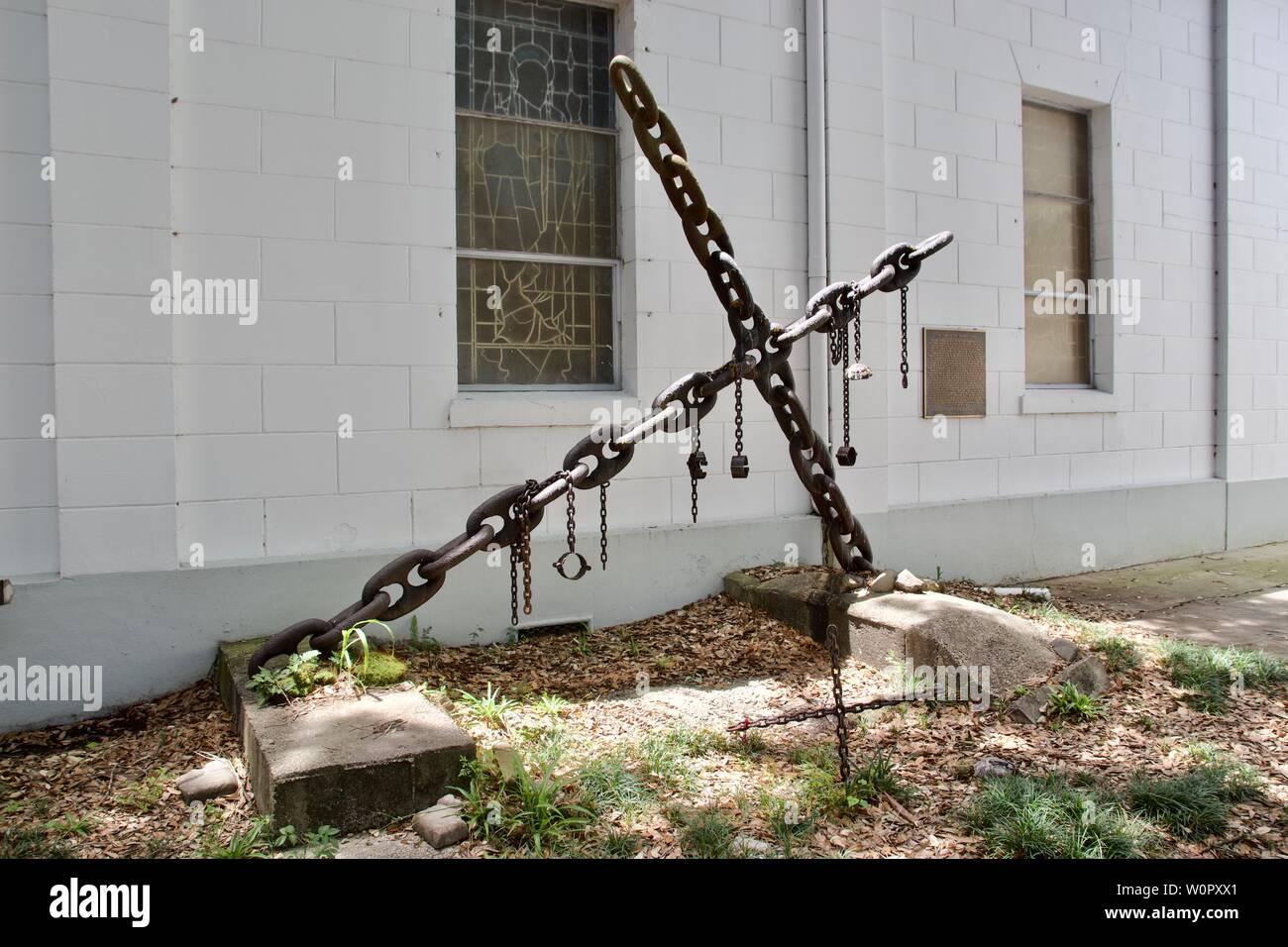 Tomba di sconosciuta slave al di fuori di chiesa di Sant'Agostino a New Orleans, Louisiana Foto Stock