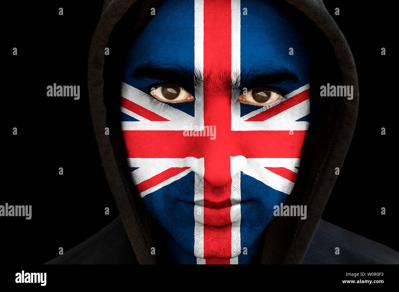 Closeup ritratto di un uomo con union jack flag face paint Foto Stock