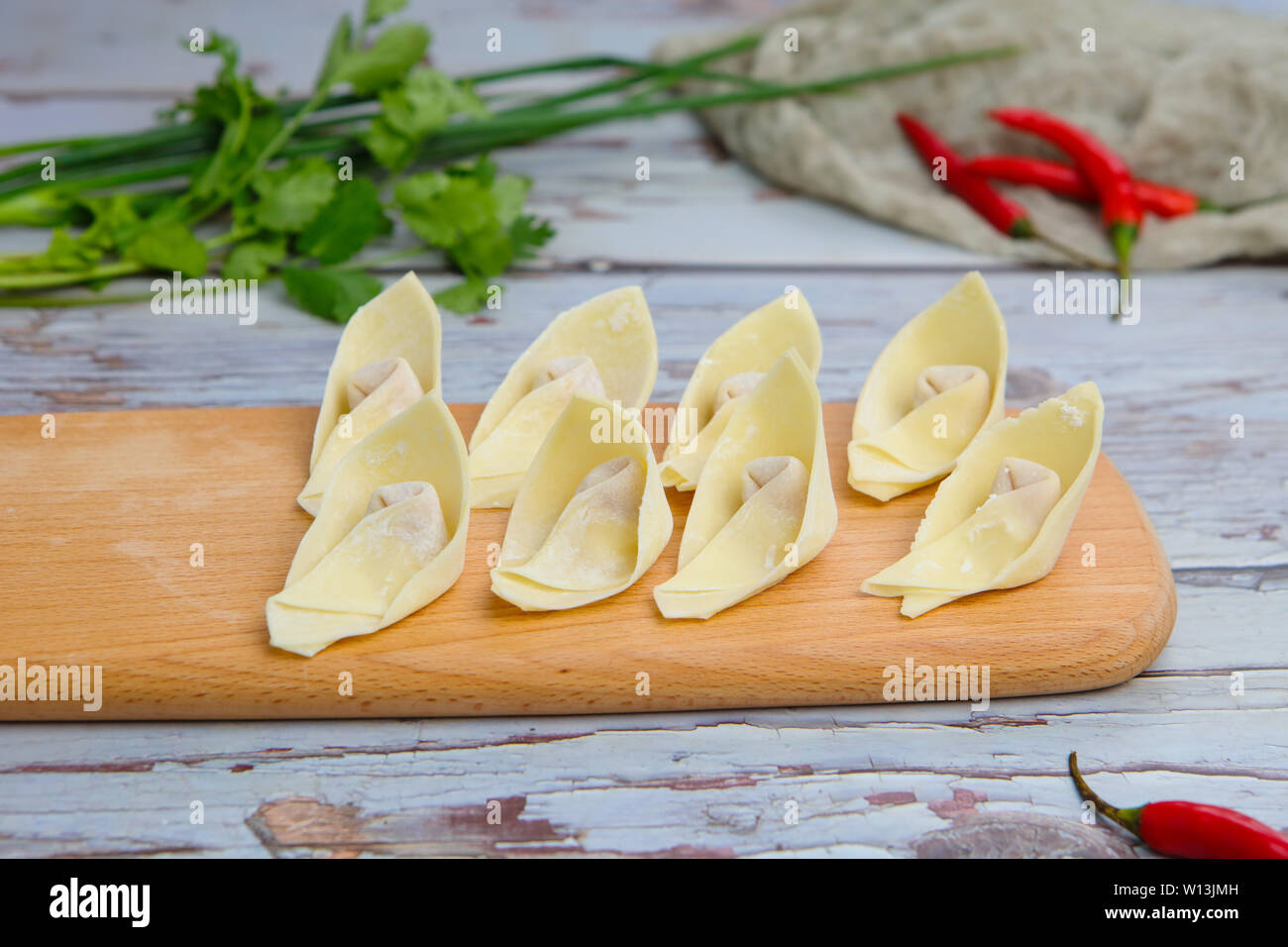 Gnocchi di patate, i wonton, Yunton, copiando le mani. Foto Stock