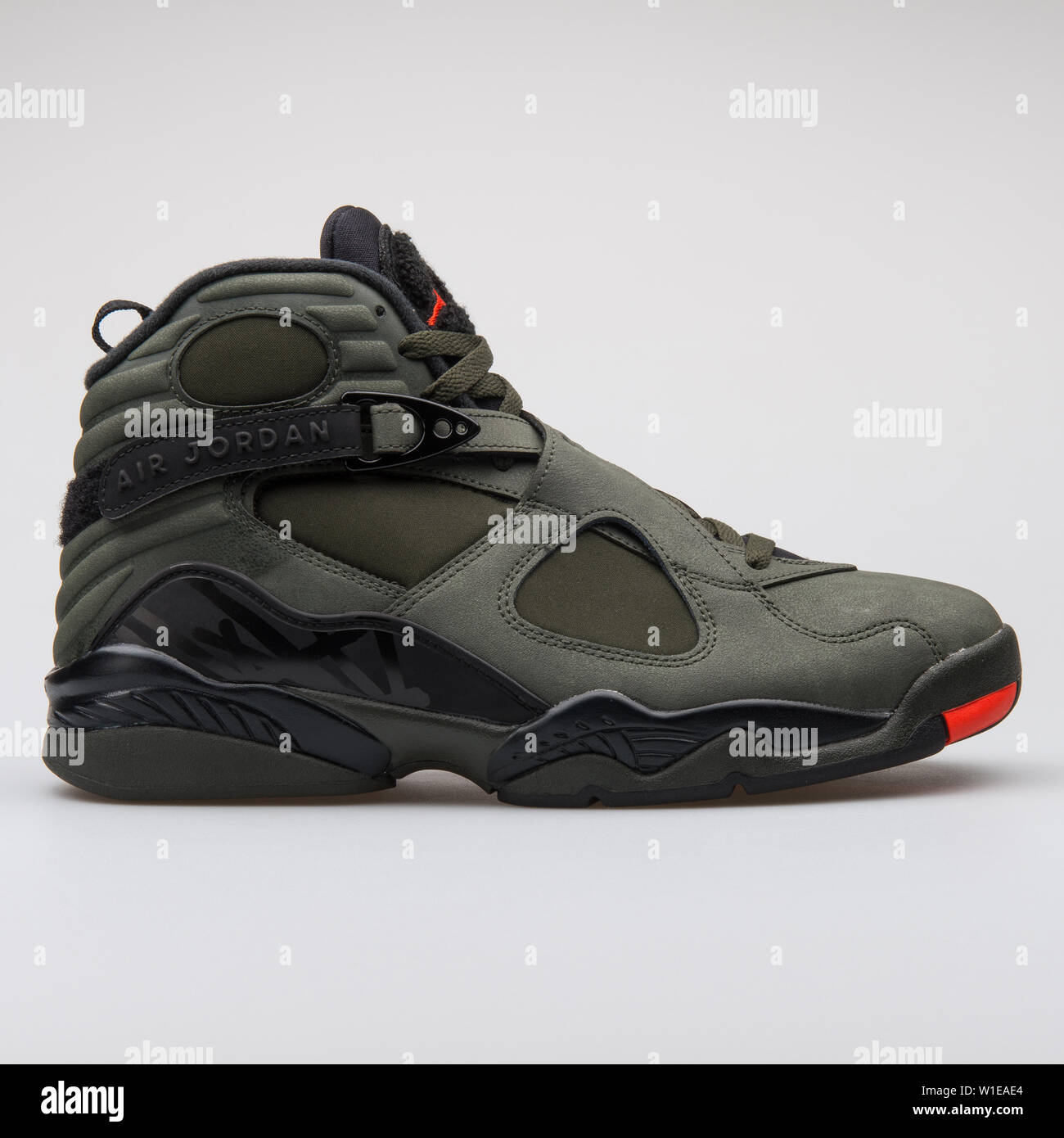 VIENNA Austria 14 giugno 2017 Nike Air Jordan 8 retro verde arancio e nero sneaker isolato su sfondo grigio Foto stock Alamy
