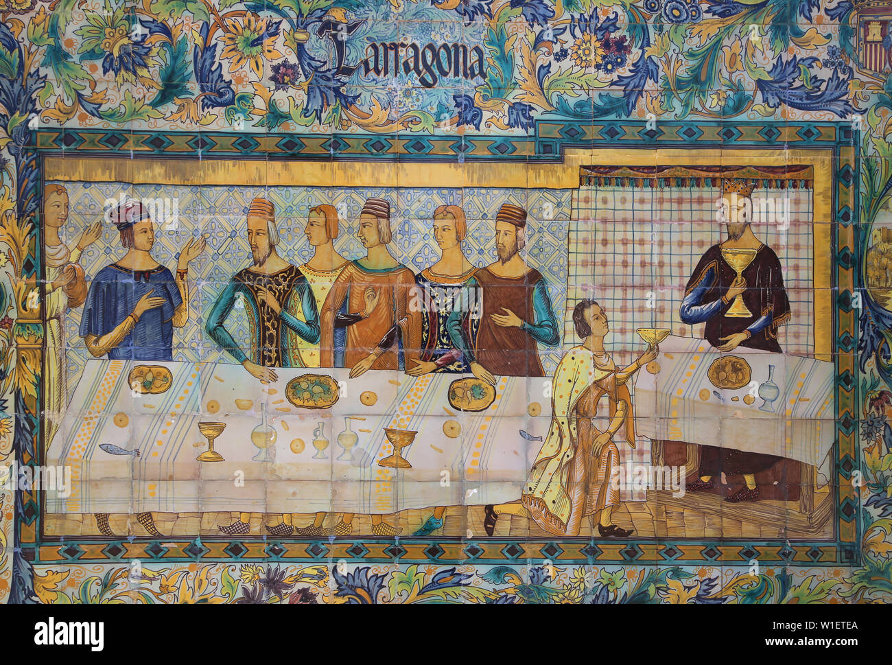 Cena in Tarragona. Giacomo I d'Aragona con i suoi signori progettò la conquista di Mallorca, 1229. Piastrelle di smalto. Piazza di Spagna. Siviglia, Spagna. Foto Stock