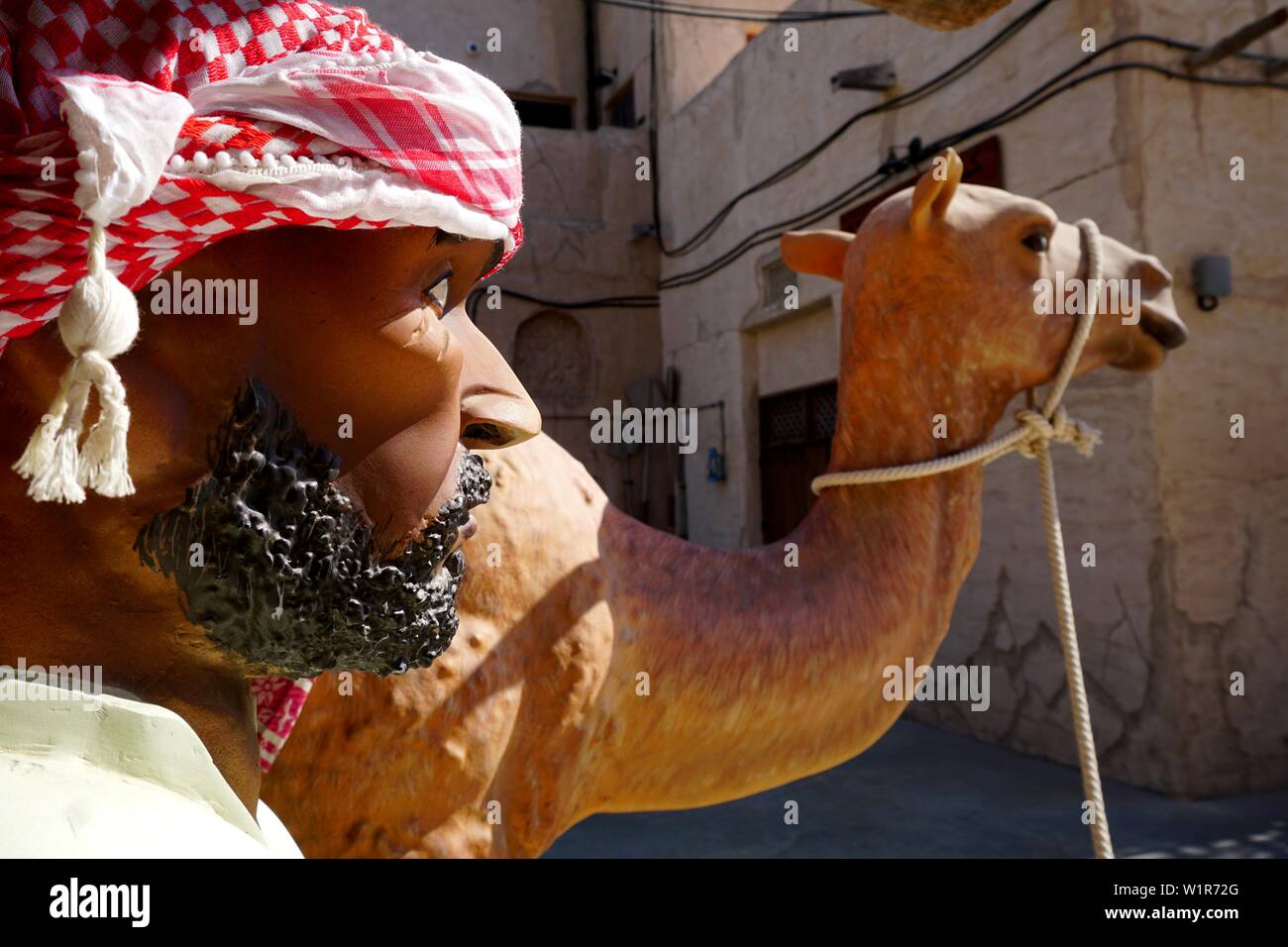 L'uomo, cammello, decorazione, Al Seef, Bur Dubai, Dubai, Emirati Arabi Uniti, Emirati Arabi Uniti Foto Stock
