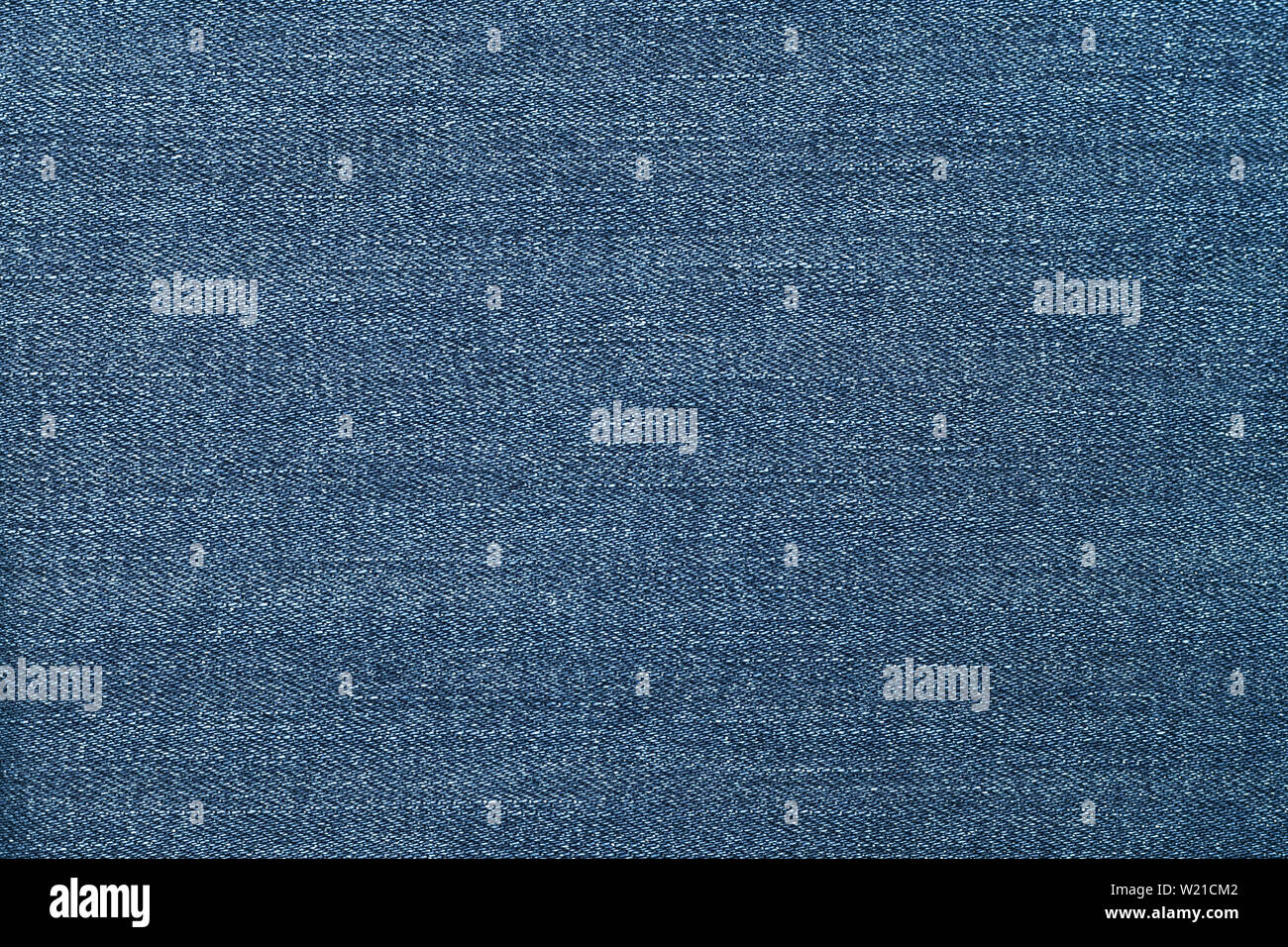 Jeans blu texture. Configurazione astratta sul blu jean sfondo. Il denim tela texture. Sfondo del materiale. Gli sfondi scuri. Abbigliamento design. Foto Stock