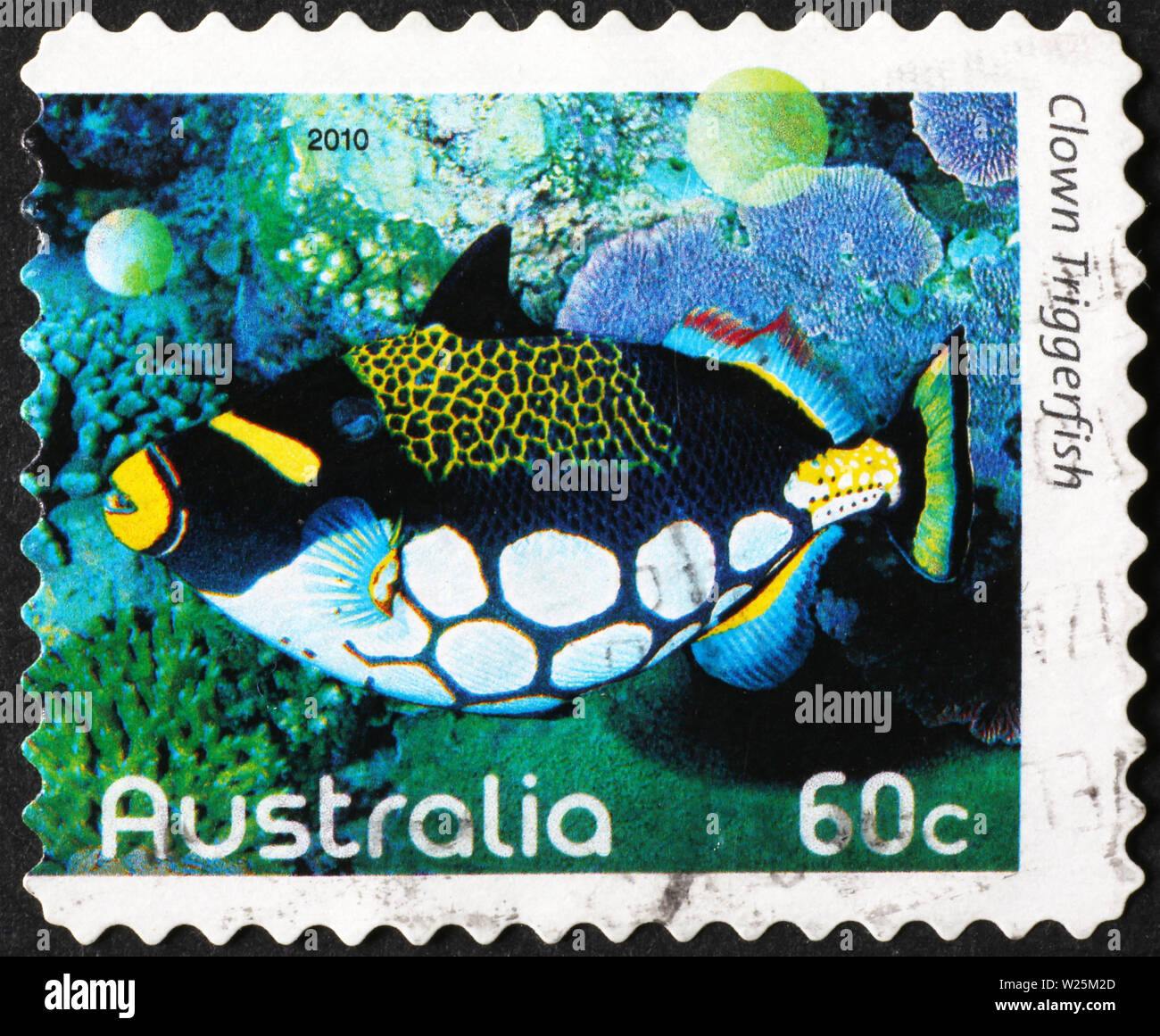Il pagliaccio pesci balestra su australian francobollo Foto Stock