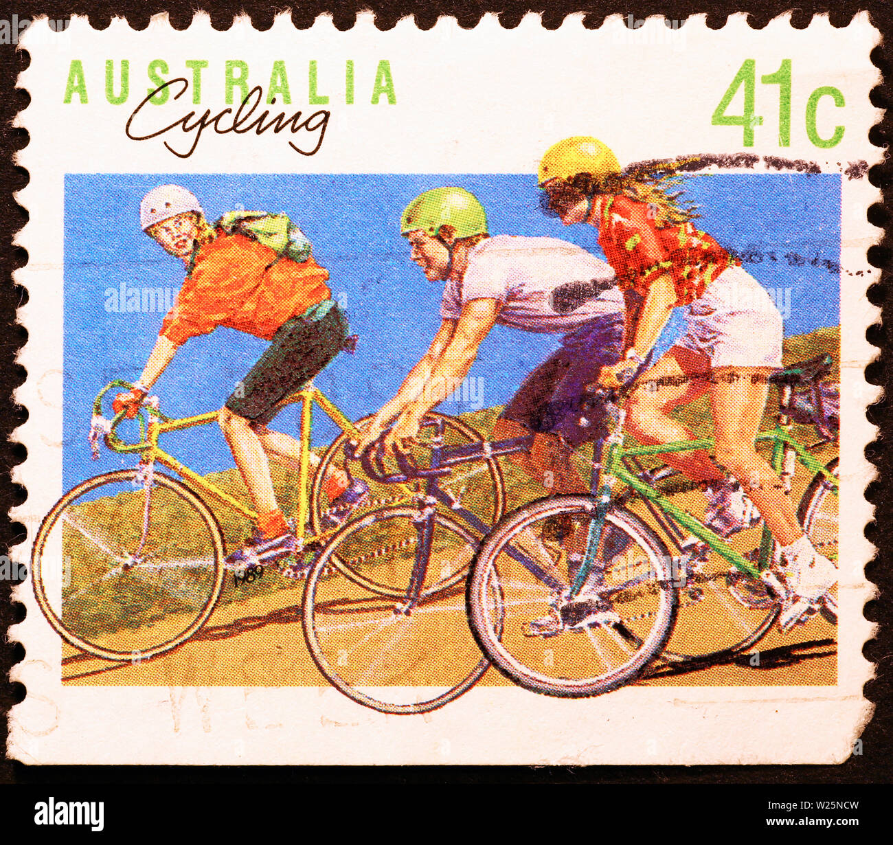 Giovani ciclisti su australian francobollo Foto Stock