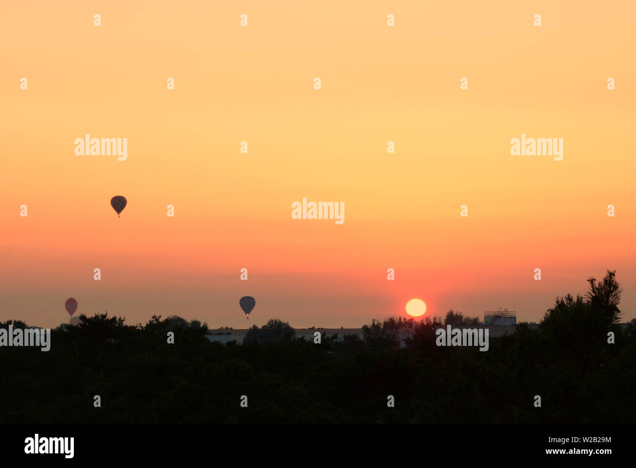 Tramonto in mongolfiera. Foto Stock