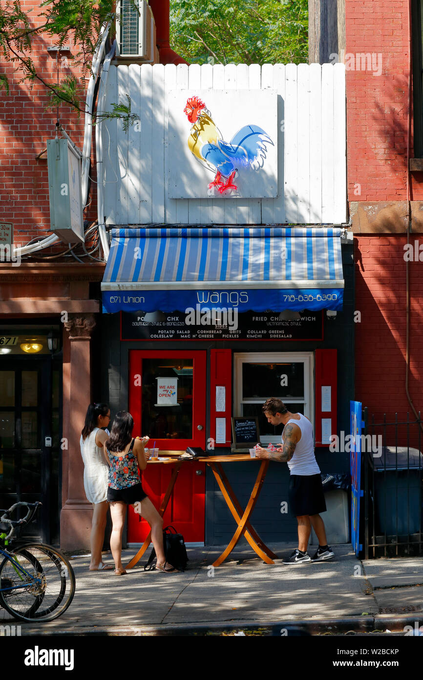 Wangs, 671 Union Street, Brooklyn, New York. esterno alla vetrina di un ristorante asiatico specializzato in pollo fritto a Park Slope. Foto Stock