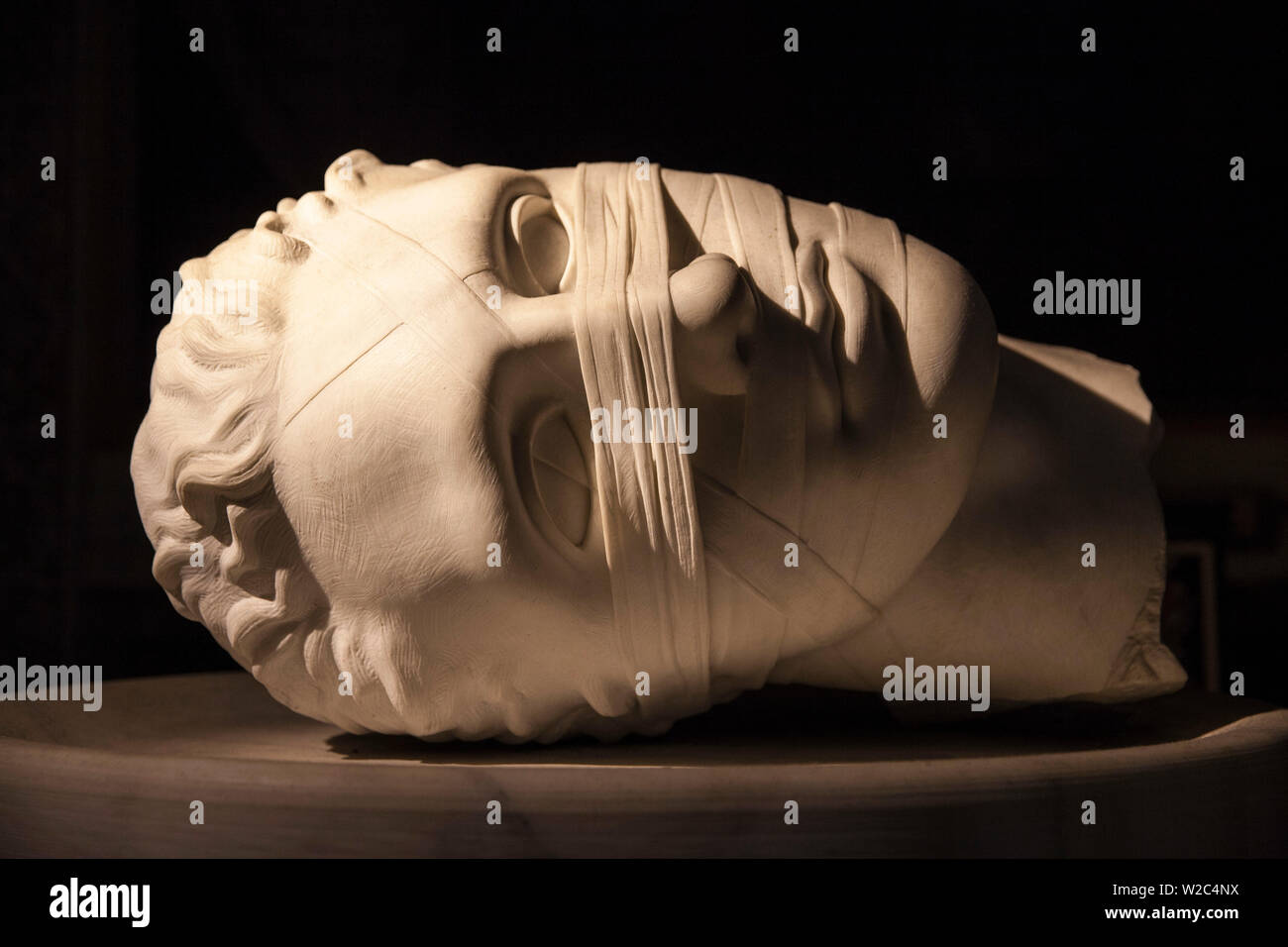 Italia Lazio Roma, scultura in marmo della testa di San Giovanni Battista all'interno della Basilica di Santa Maria degli Angeli di Martiri Foto Stock