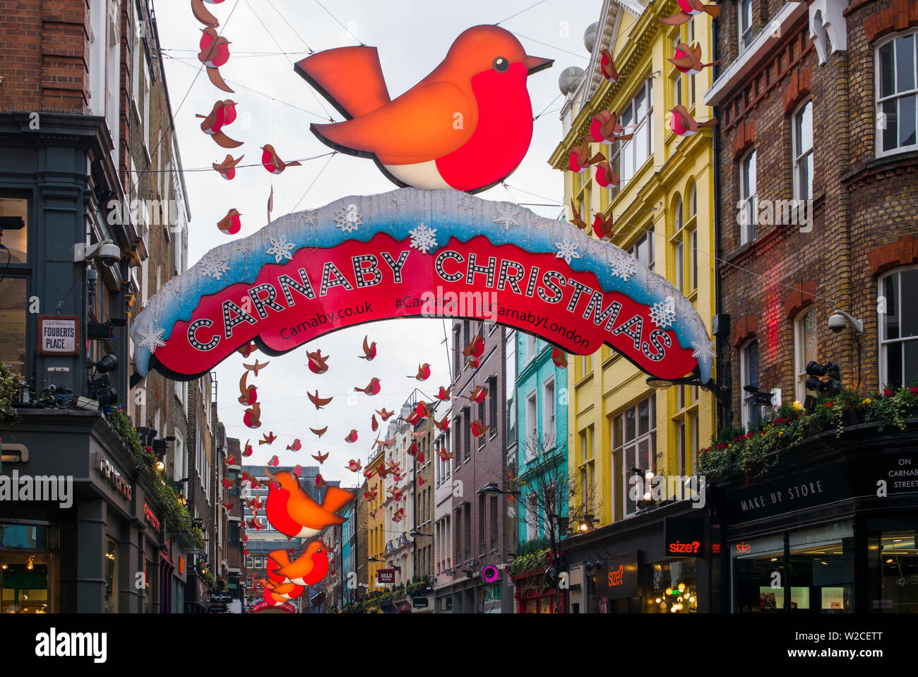 Inghilterra, Londra, Soho, Carnaby Street, Natale segni Foto Stock