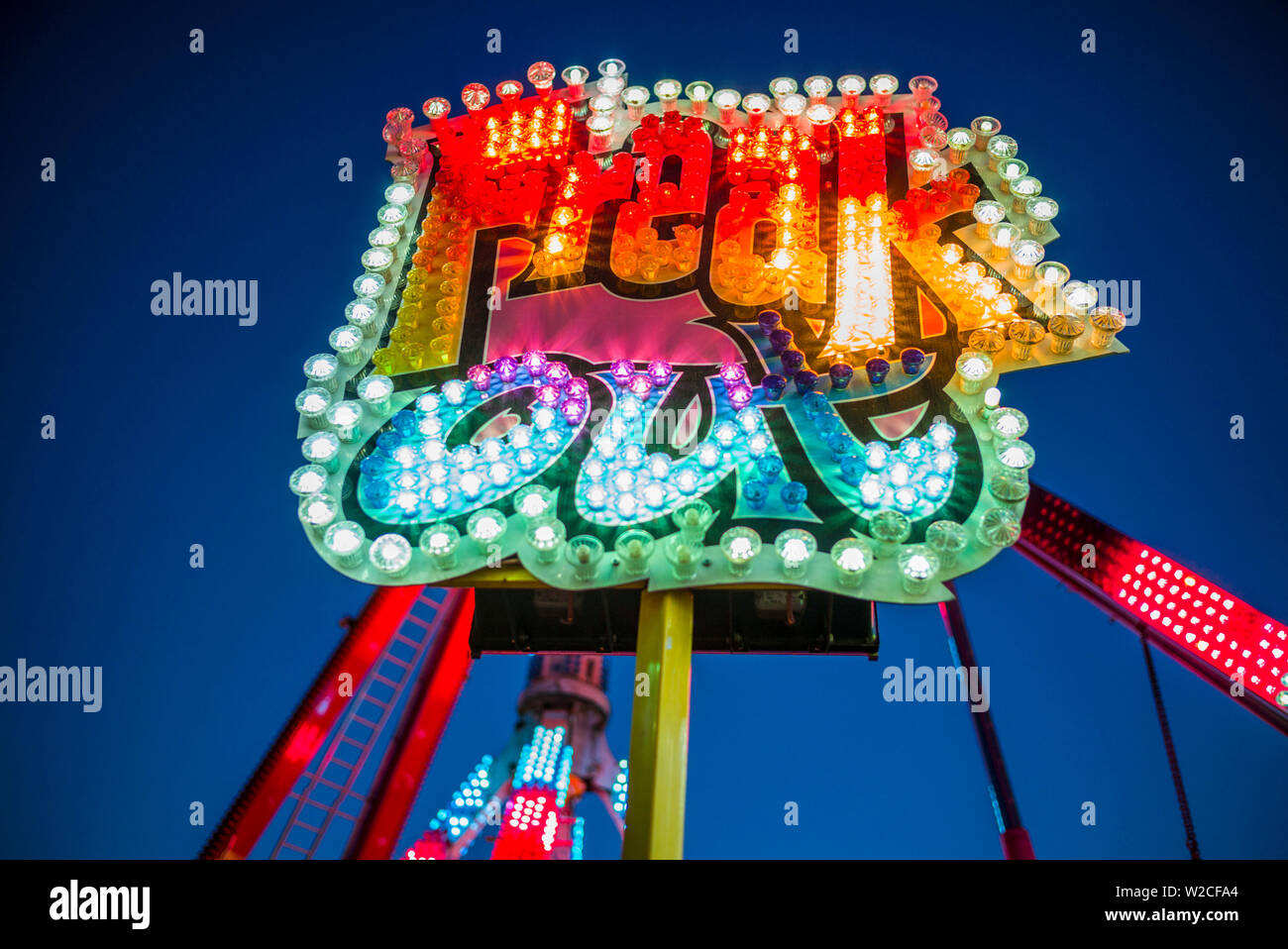 Stati Uniti d'America, Massachusetts, Cape Ann, Gloucester, San Pietro Fiesta, Italian-Portuguese comunità di pesca festival, Carnival Ride, Freak Out, crepuscolo Foto Stock