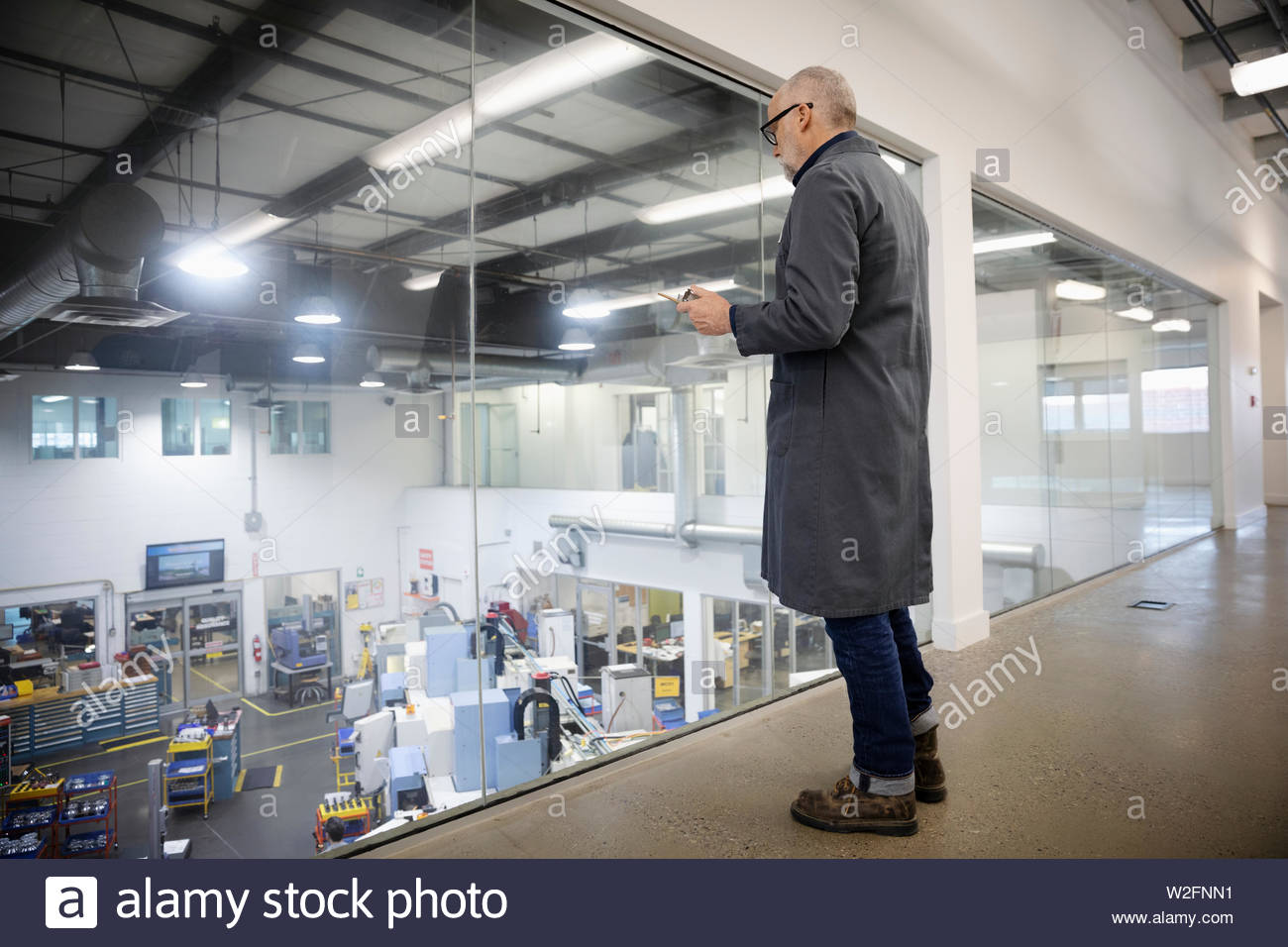 Machine shop manager supervisione di fabbrica Foto Stock