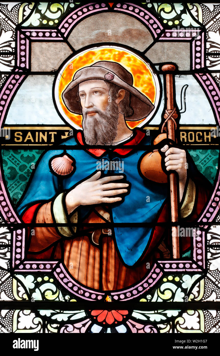 Saint Roch. Egli è il santo patrono dei cani. Finestra di vetro colorato. Combloux. La Francia. Foto Stock