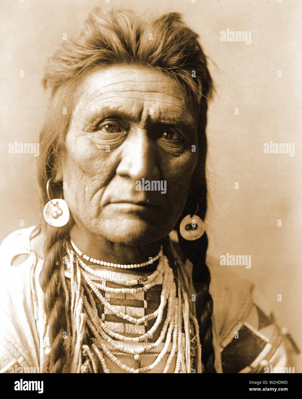 Edward S. Curtis nativi indiani americani - Crow Indian uomo ca.1908 Foto Stock