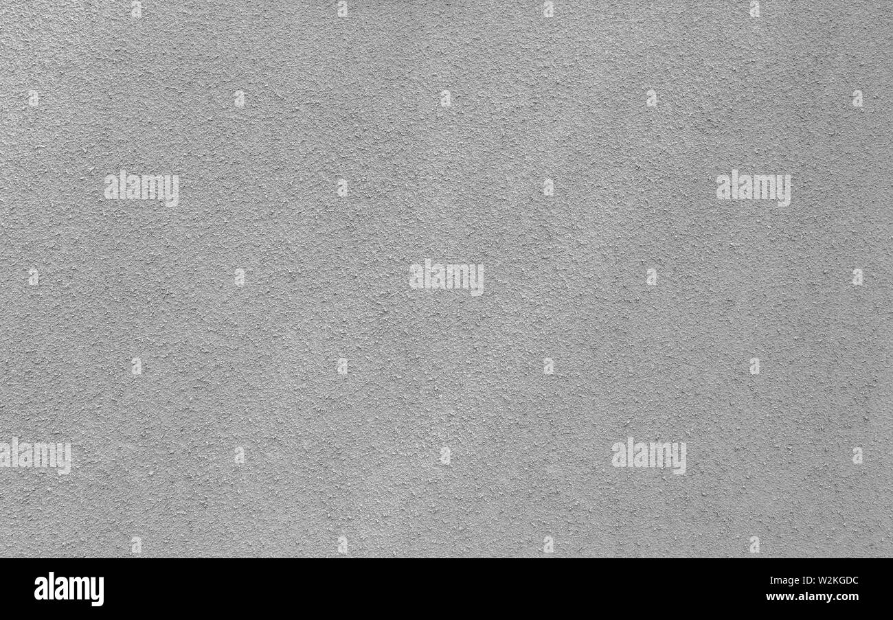 Intonacate e dipinte, ruvido e grigio cemento o muro di pietra in bianco e nero. Alta risoluzione full frame sfondo a trama. Foto Stock