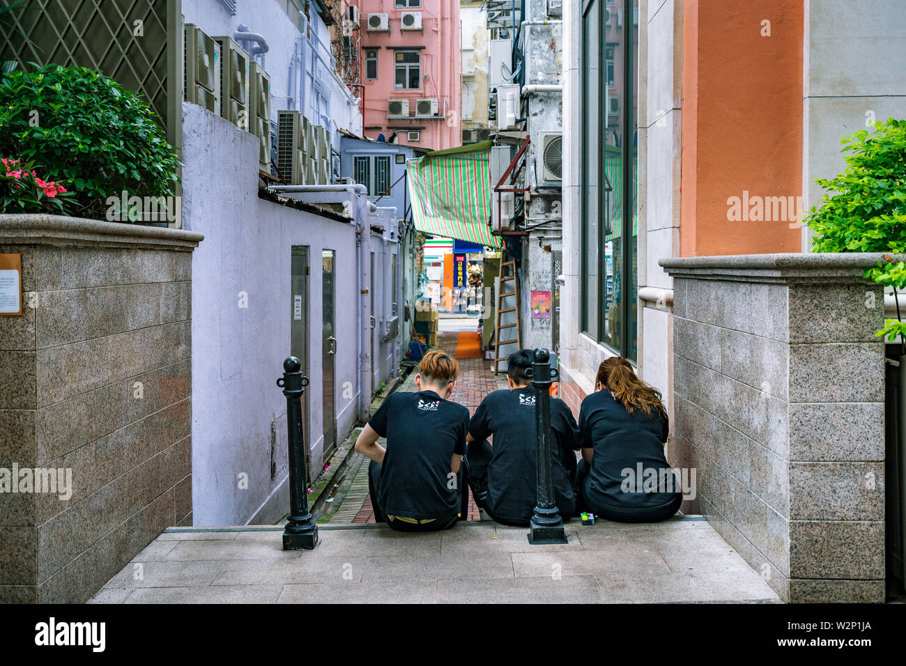 Hong Kong Cina - Ristorante i lavoratori in pausa Foto Stock