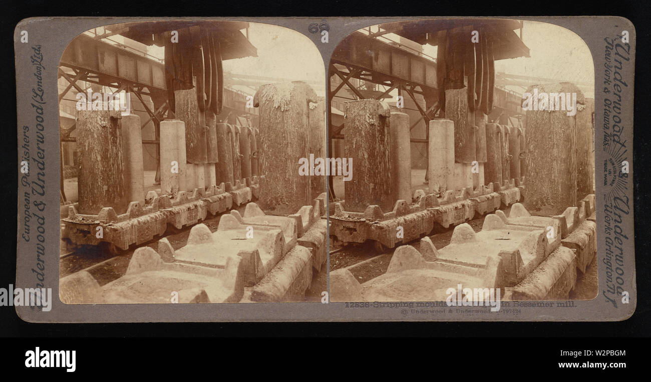 Stampi di stripping da lingotti in Bessemer mulino.; Underwood & Underwood Stereographs di industrie manifatturiere, impostare 5 - fabbricazione di ferro e acciaio mediante diversi processi, Immagine 30 - Scomposizione stampi da lingotti in Bessemer mulino. Questi stereographs sono state create e venduto come un set per l'uso didattico da Underwood & Underwood, un creatore di immagini stereoscopiche e attrezzature. Questa serie è stata prodotta tra il 1895, quando l'unità educativa è stato stabilito, e nel 1921, quando la società è stata venduta. Foto Stock