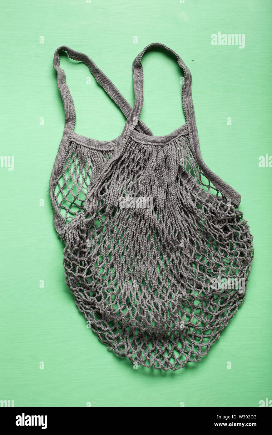 Riutilizzabili in cotone a maglia shopping bag, plastica libera zero rifiuti Nozione Foto Stock