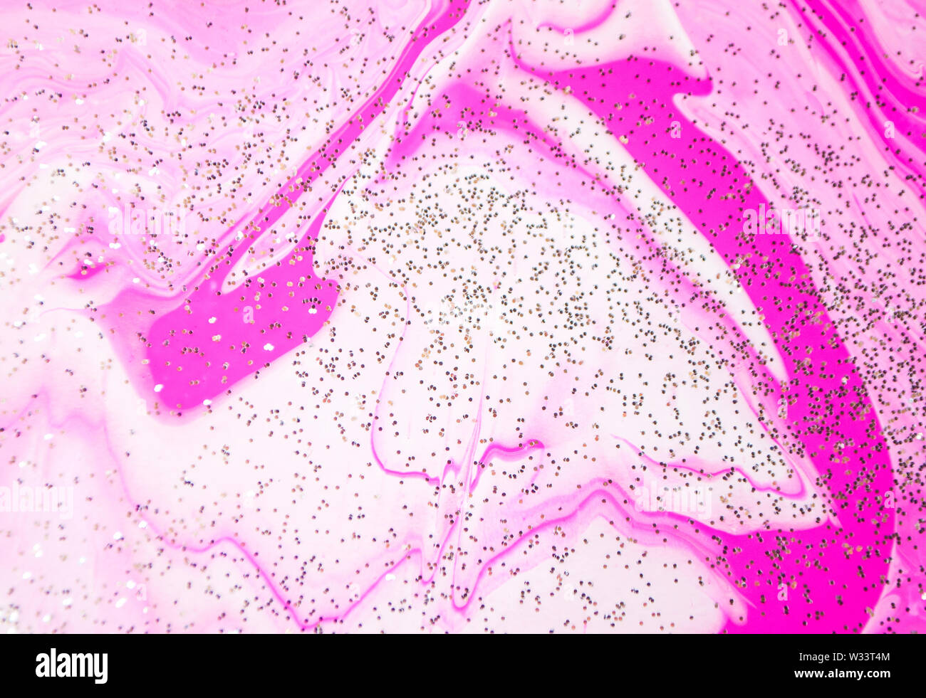 Abstract colorato sfondo dipinto realizzato nel fluido tecnica. Arte di fluido nel modello di colori alla moda con glitter. Foto Stock