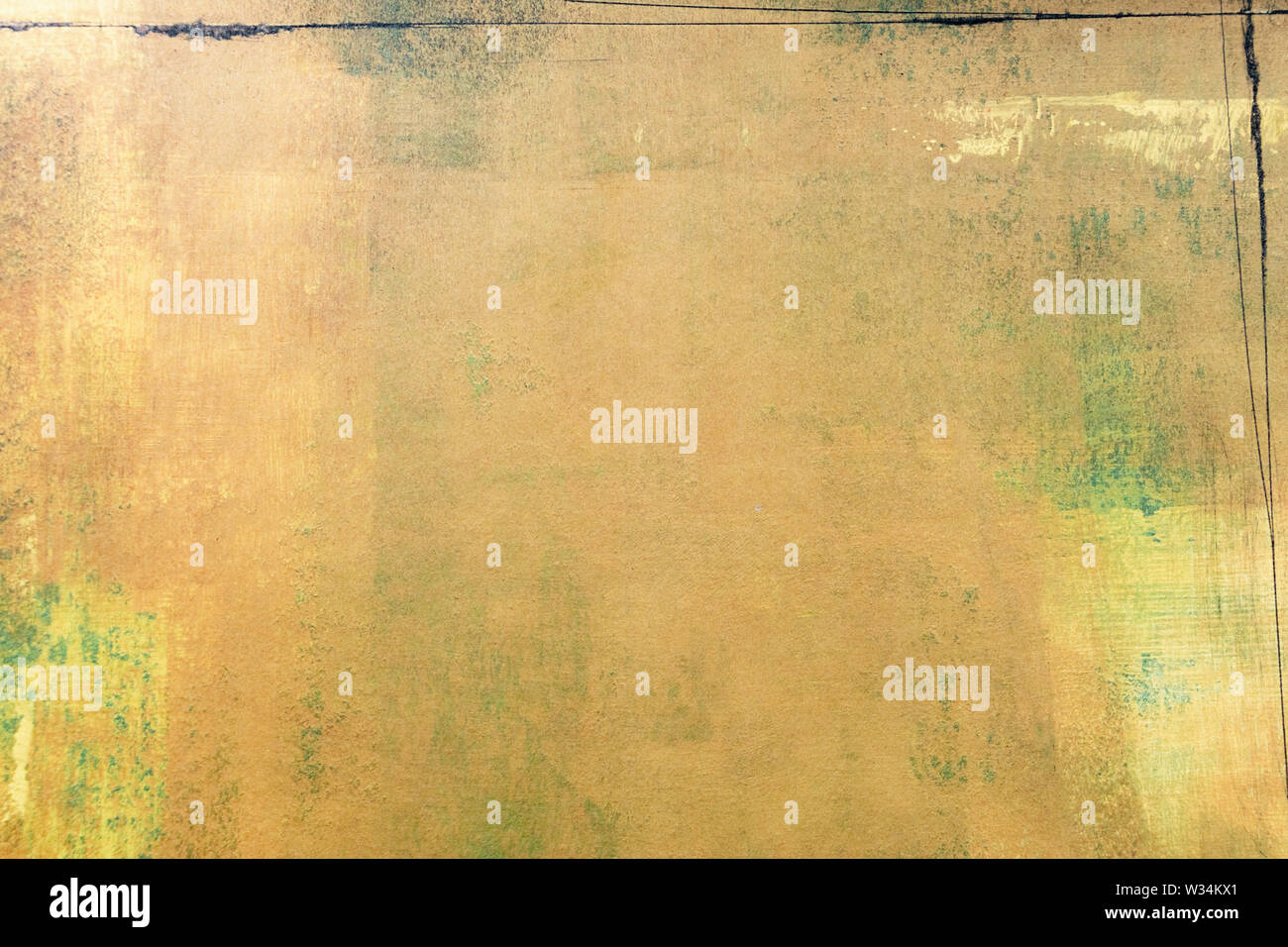 Risorse grafiche, parete giallo ocra e di colore grigio-verde macchiato di ruggine grunge stile Foto Stock