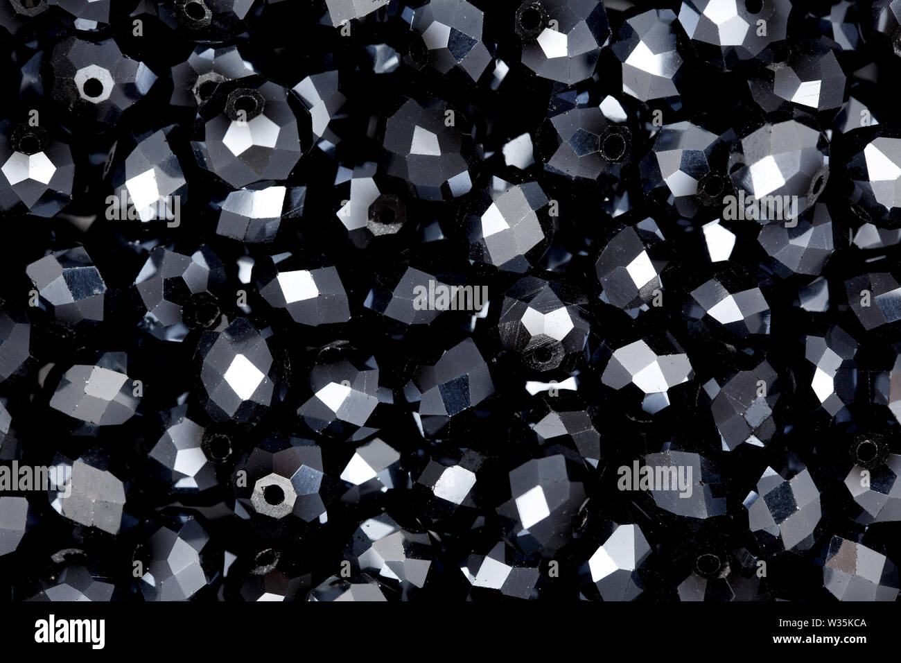 Perle nere sullo sfondo. Alta qualità texture in una risoluzione estremamente elevata. Foto Stock