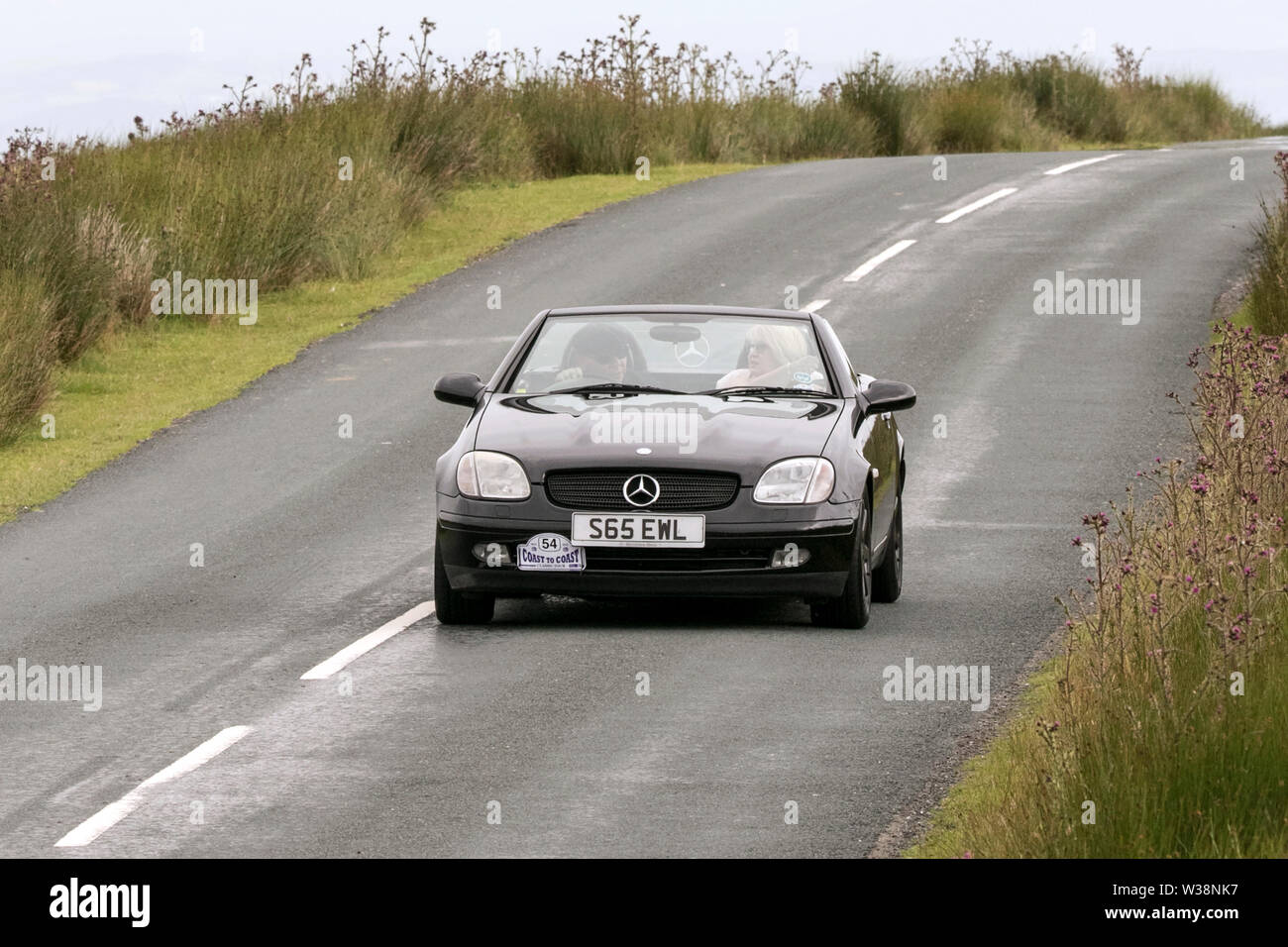 Lancashire Automobile Club costa a costa 2019; a partire da Midland Hotel a Morecambe e finendo a Dunsley Hall di Sandsend vicino a Whitby questa annata auto coast to coast rally percorso attraversa le alture del fantastico paesaggio nel trogolo di Bowland con viste sulla baia di Morecambe. La manifestazione è aperta ai classici e amati vetture del patrimonio di tutte le età assumendo la sfida di un percorso lungo circa 170 miglia di sentieri e strade di Inghilterra rurale. Foto Stock