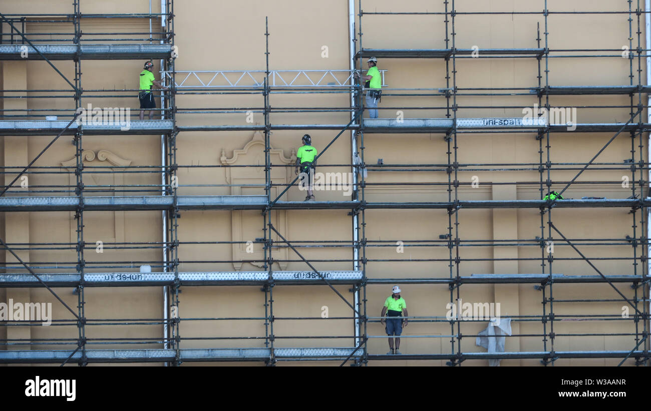 Melbourne Australia: i lavoratori sui ponteggi su un cantiere di Melbourne. Foto Stock