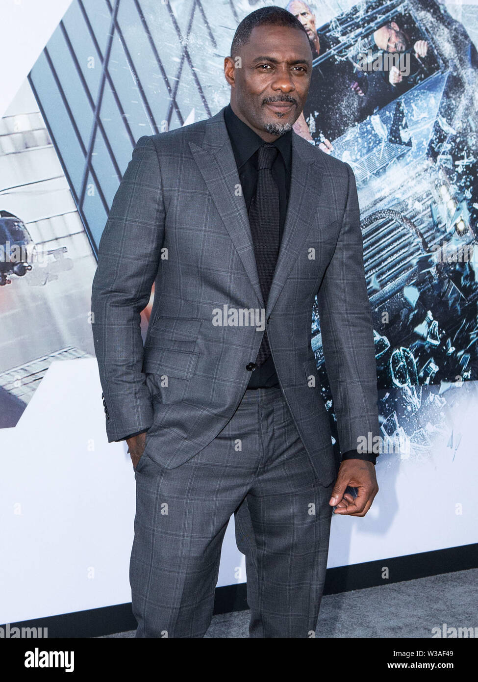 HOLLYWOOD e LOS ANGELES, CALIFORNIA, STATI UNITI D'America - 13 Luglio: Attore Idris Elba arriva a Los Angeles prima di Universal Pictures' 'Fast & Furious presenta: Hobbs & Shaw" tenutasi presso il Teatro Dolby sulla luglio 13, 2019 a Hollywood e Los Angeles, California, USA. (Foto di Rudy Torres/Image Press Agency) Foto Stock