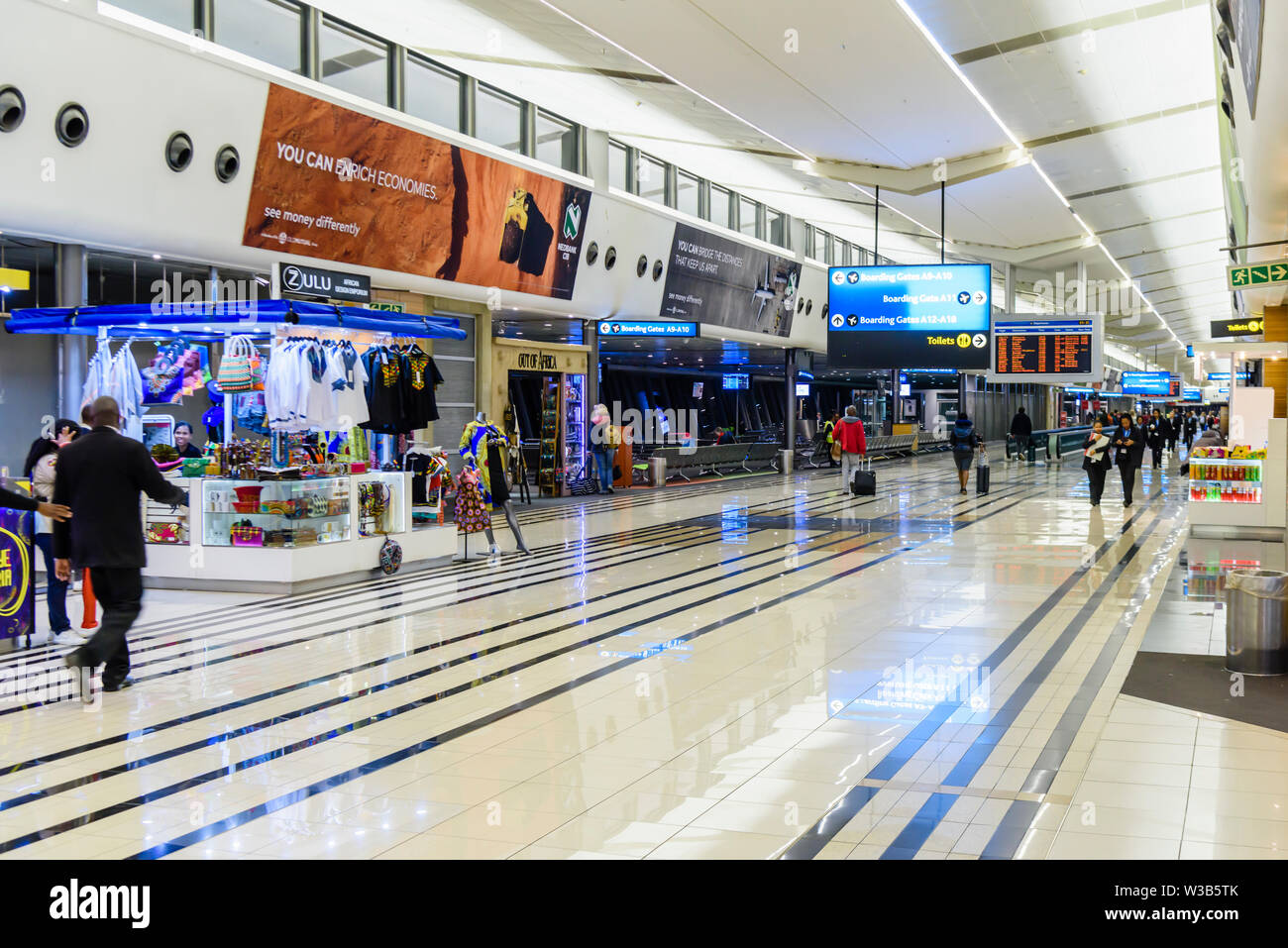 Partenza lounge all'interno O.R Tambo Aeroporto Internazionale di Johannesburg, Sud Africa Foto Stock