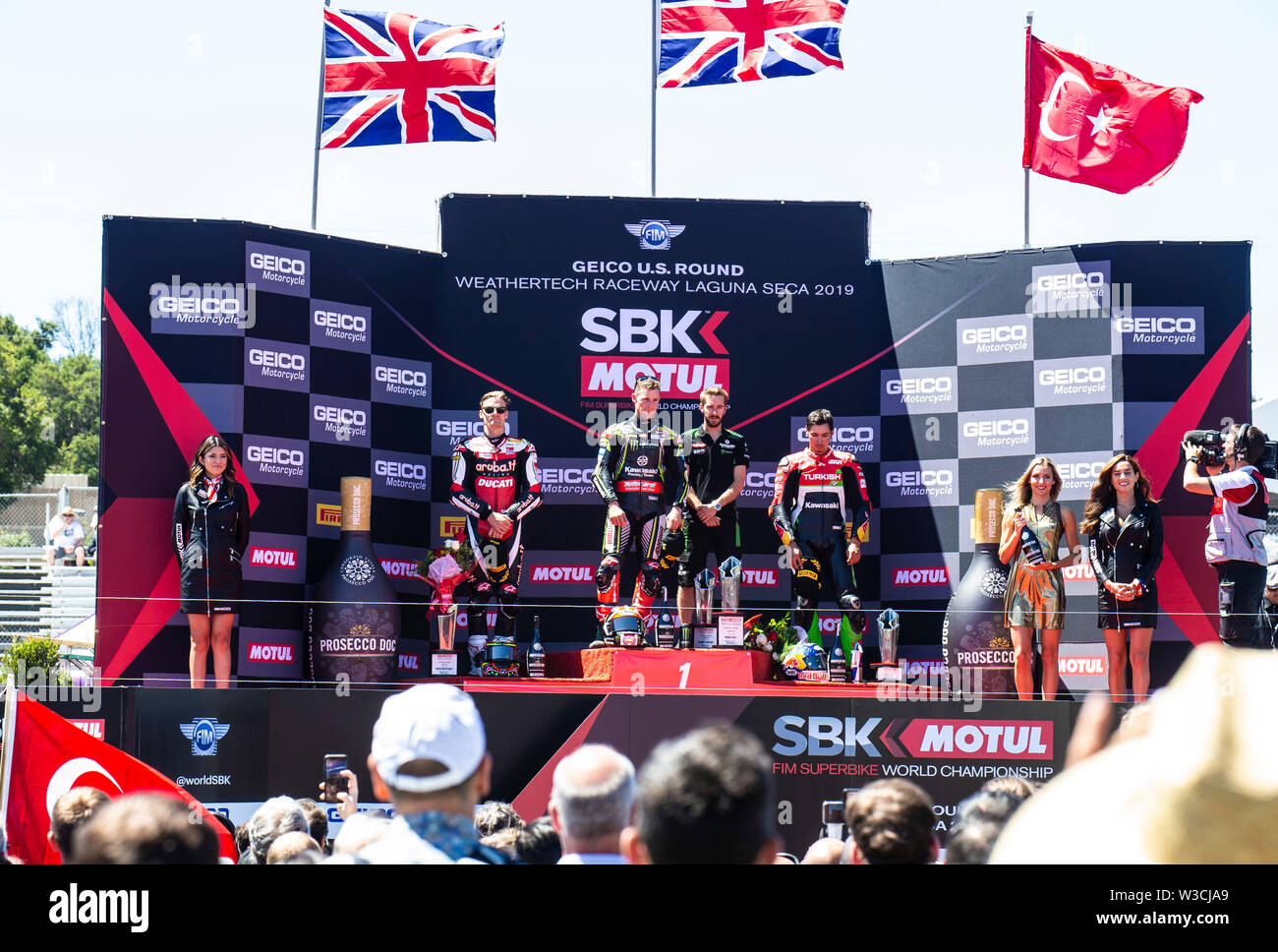 Monterey, CA, Stati Uniti d'America. 13 Luglio, 2019. Un primo posto Jonathan Rea, Chaz Davies e Toprak Razgatliolu sul podio dopo il Motul FIM Superbike World Championship Geico U.S. Giro del Mondo SBK gara 1a Weathertech Raceway Laguna Seca Monterey, CA Thurman James/CSM/Alamy Live News Foto Stock