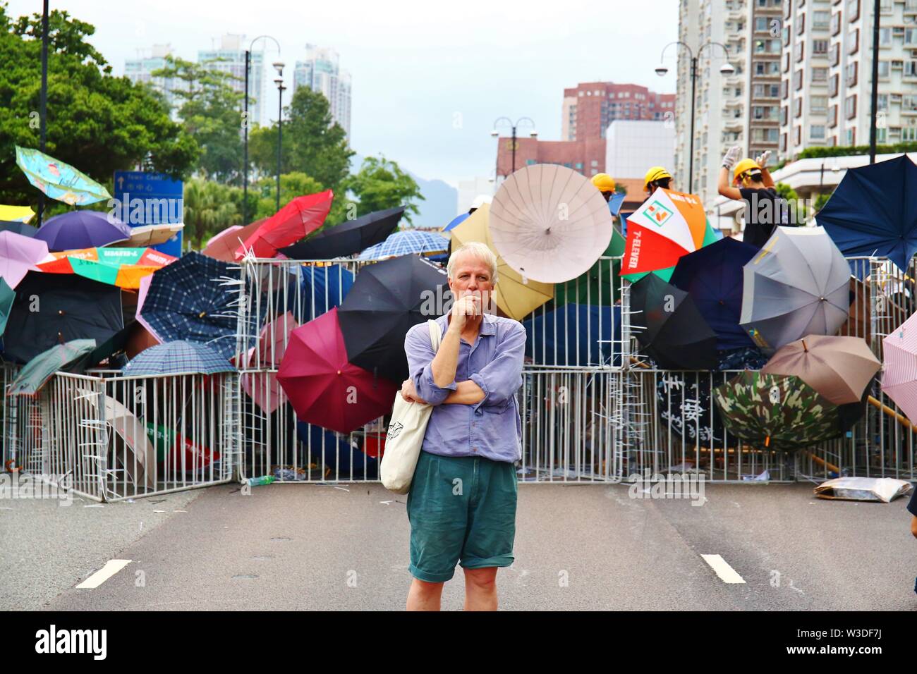 Hong Kong Cina - Luglio 14th, 2019. Decine di migliaia di persone sono scese in piazza in Sha Tin in Hong Kong. I dimostranti chiedono il ritiro totale della legge in materia di estradizione come uno dei cinque principali richieste. Credito: Gonzales foto/Alamy Live News Foto Stock