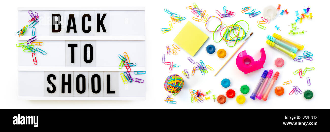 Panorama di colorati di forniture scolastiche isolato su bianco. Si torna a scuola concept Foto Stock
