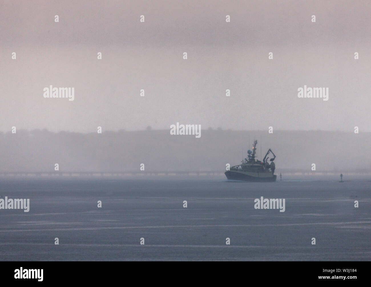 Crosshaven, Cork, Irlanda. 16 Luglio, 2019. Trawler Buddy M ritorna su un mattino cielo coperto dal mare Celtico con un volume di catture di eglefino e merlano da Crosshaven, Co. Cork, Irlanda. Credito: David Creedon/Alamy Live News Foto Stock