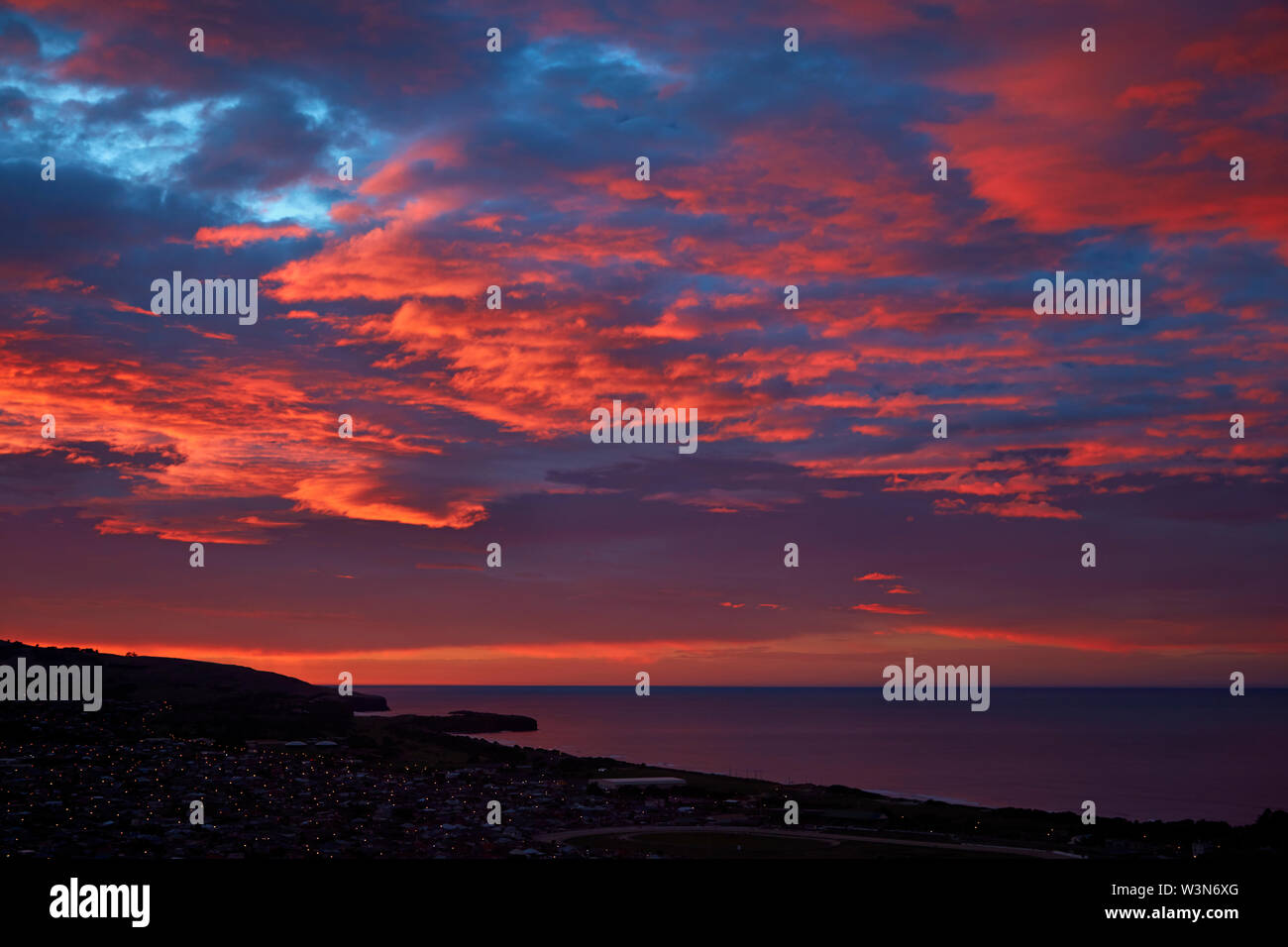 Sunrise su St Kilda Beach e Oceano Pacifico, Dunedin, Otago, Isola del Sud, Nuova Zelanda Foto Stock