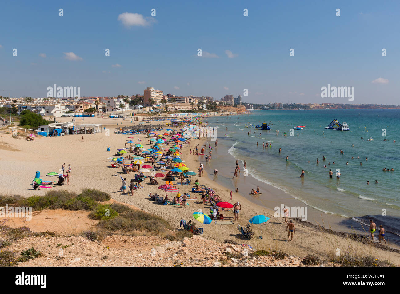 Mil Palmeras Costa Blanca Spagna bella spiaggia del Mediterraneo e la costa a sud di Cabo Roig Foto Stock