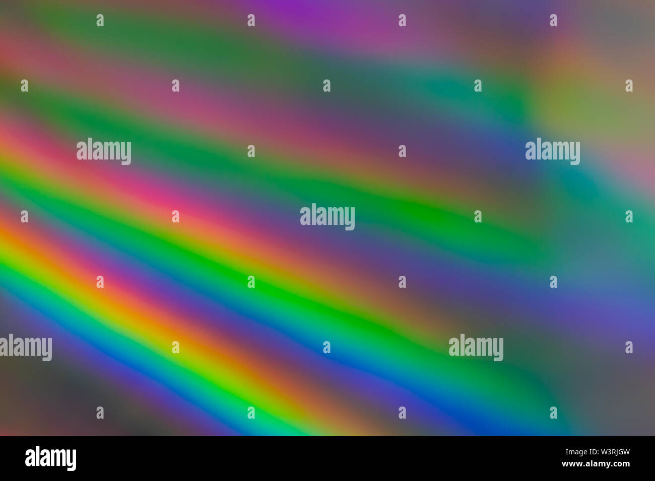 Colorata carta olografica con luci di Rainbow. Foto Stock