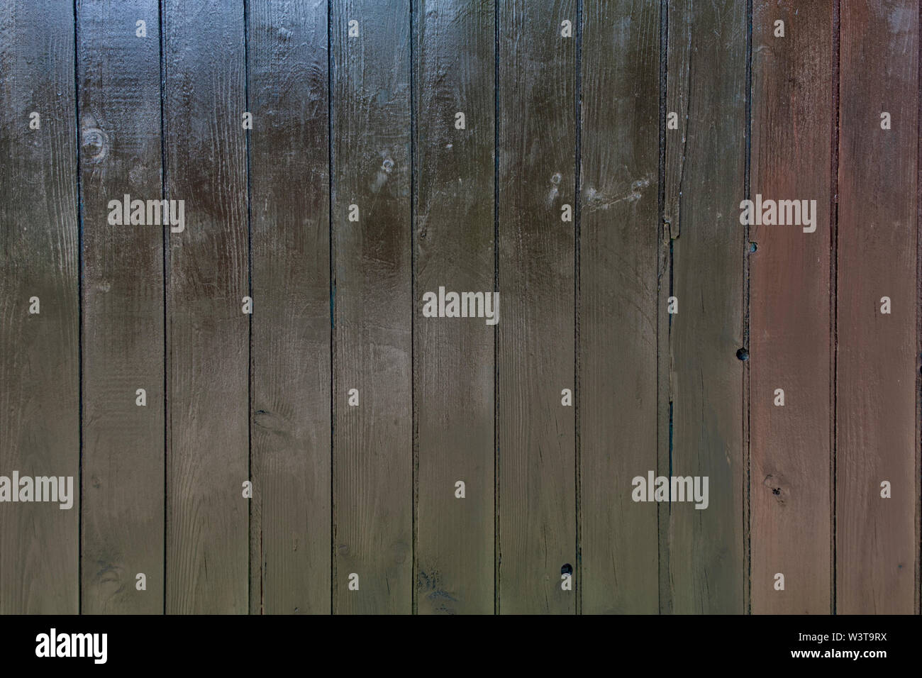 Nero parete in legno con diversi pattern di colori. Foto Stock